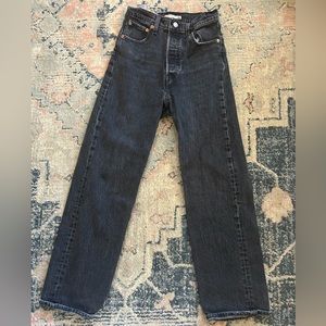 black levi straight leg ankle jeans. they are a size 26 and they are black.